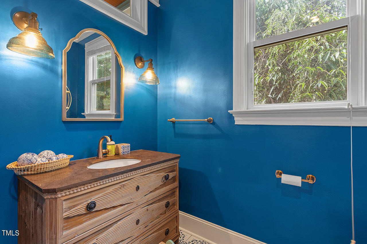 808 Elm Street Raleigh, NC 27604 - Photo 24 of 44 a view of cabinet with washer and dryer