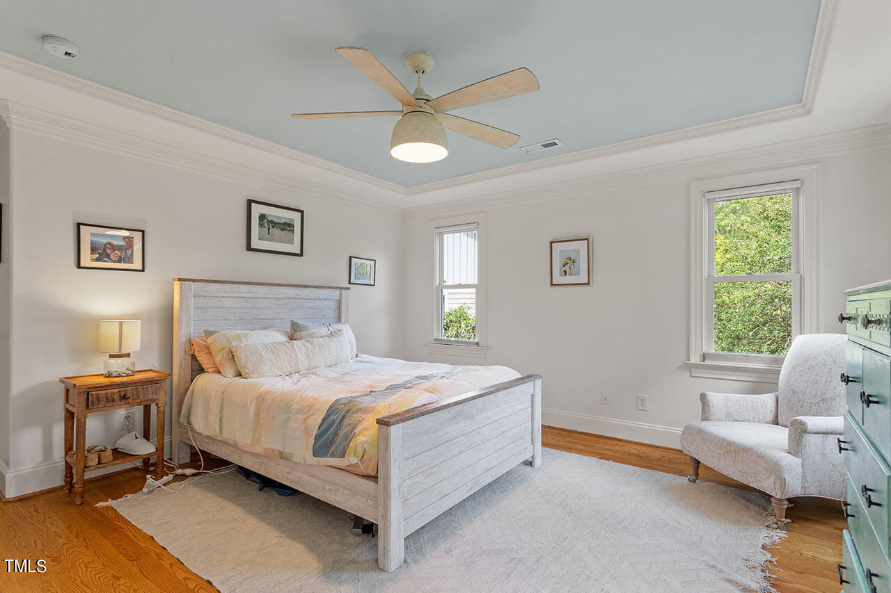 808 Elm Street Raleigh, NC 27604 - Photo 25 of 44 a bedroom with a bed and a window