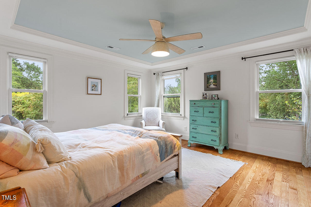 808 Elm Street Raleigh, NC 27604 - Photo 26 of 44 a bedroom with a large bed and a window