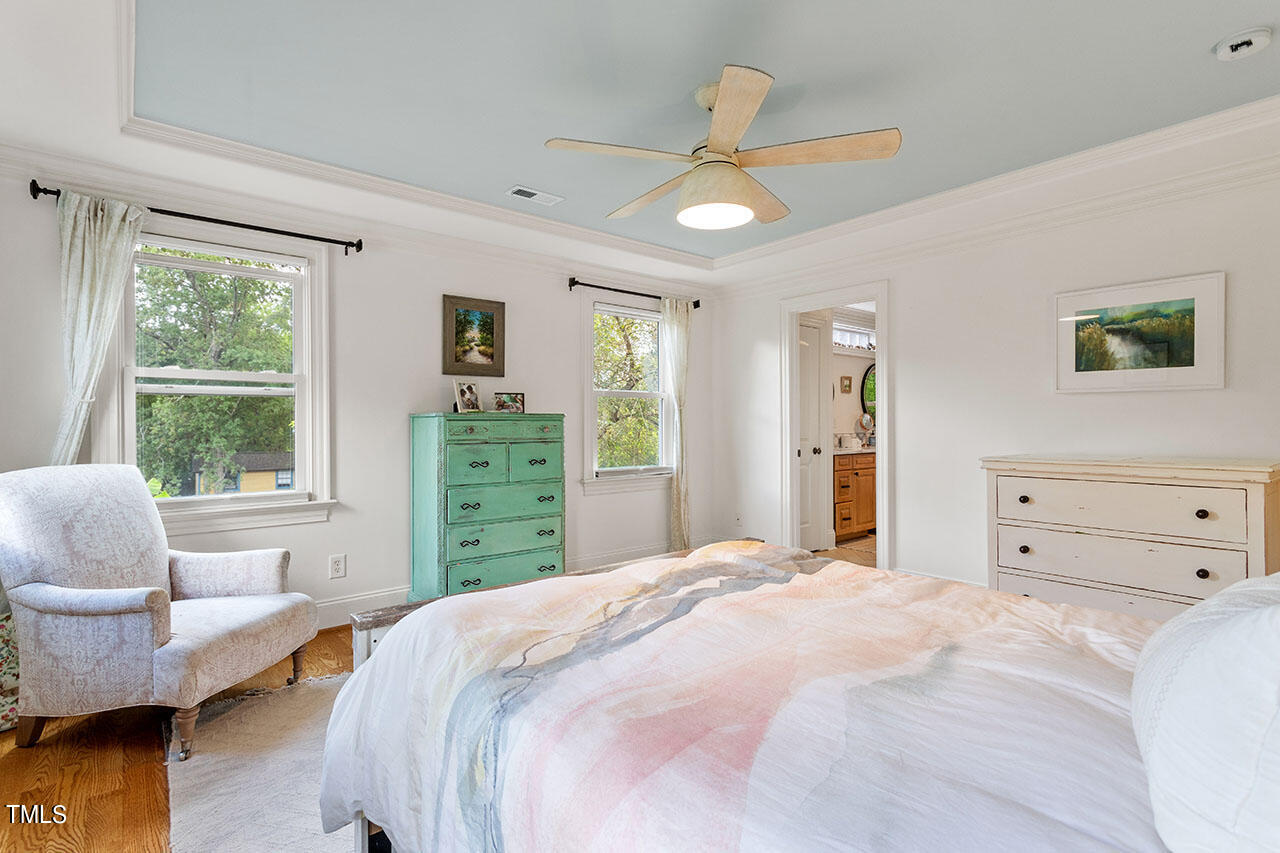 808 Elm Street Raleigh, NC 27604 - Photo 27 of 44 a bedroom with a bed and a window