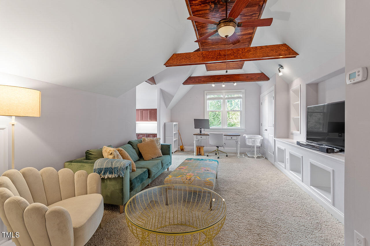808 Elm Street Raleigh, NC 27604 - Photo 37 of 44 a living room with furniture and a flat screen tv