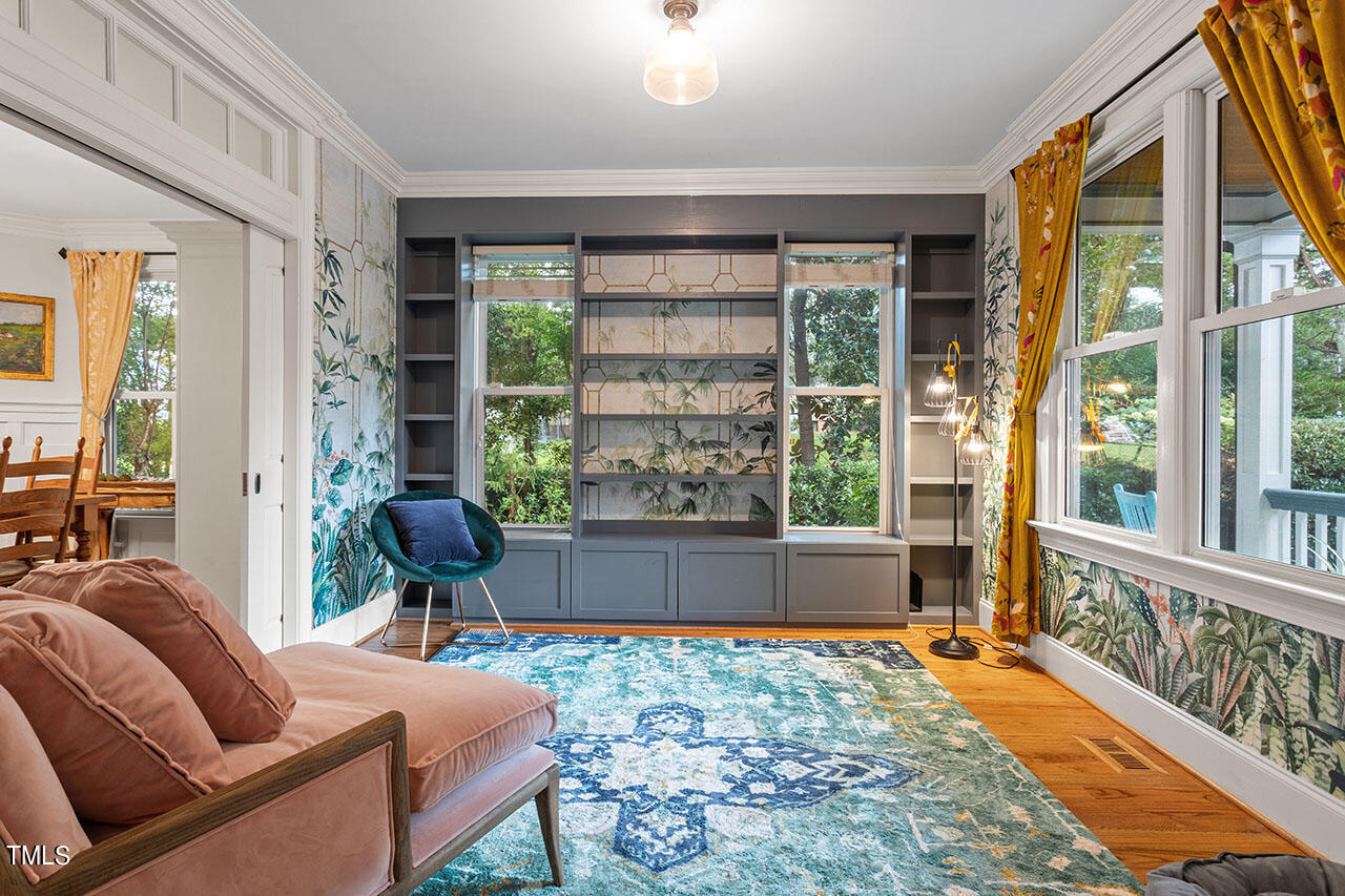 808 Elm Street Raleigh, NC 27604 - Photo 9 of 44 a living room filled with furniture and a large window