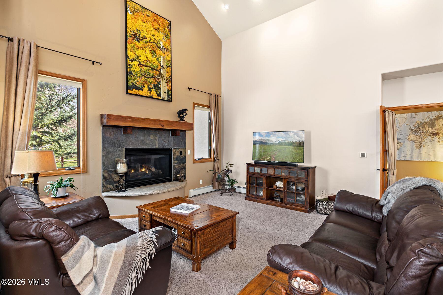 91 Creamery Trail Edwards, CO 81632 - Photo 8 of 44 a living room with furniture and a fireplace