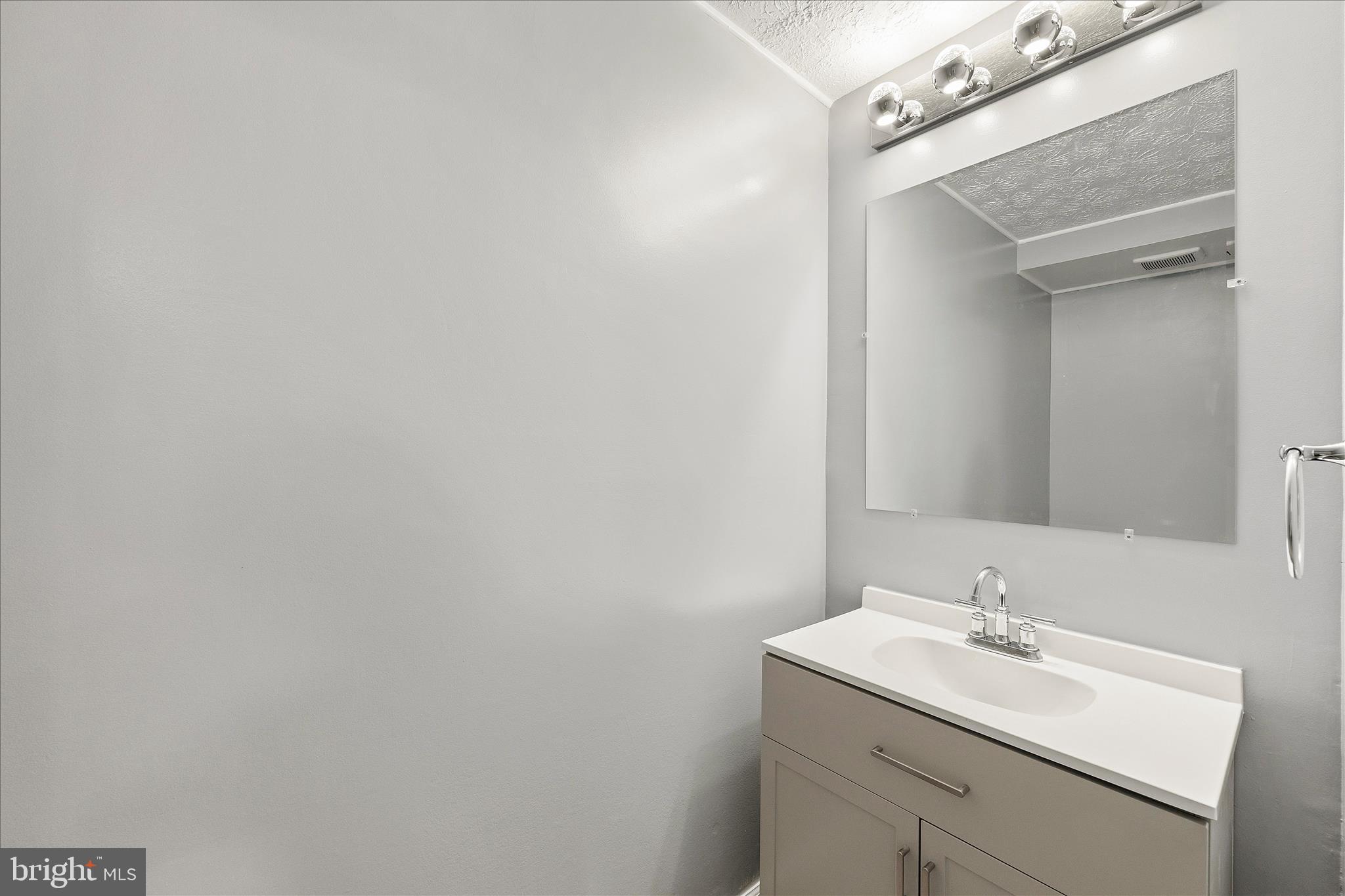 1121 Harvard Street Northwest, Unit F Washington, DC 20009 - Photo 17 of 40 Half Bath 1st Floor