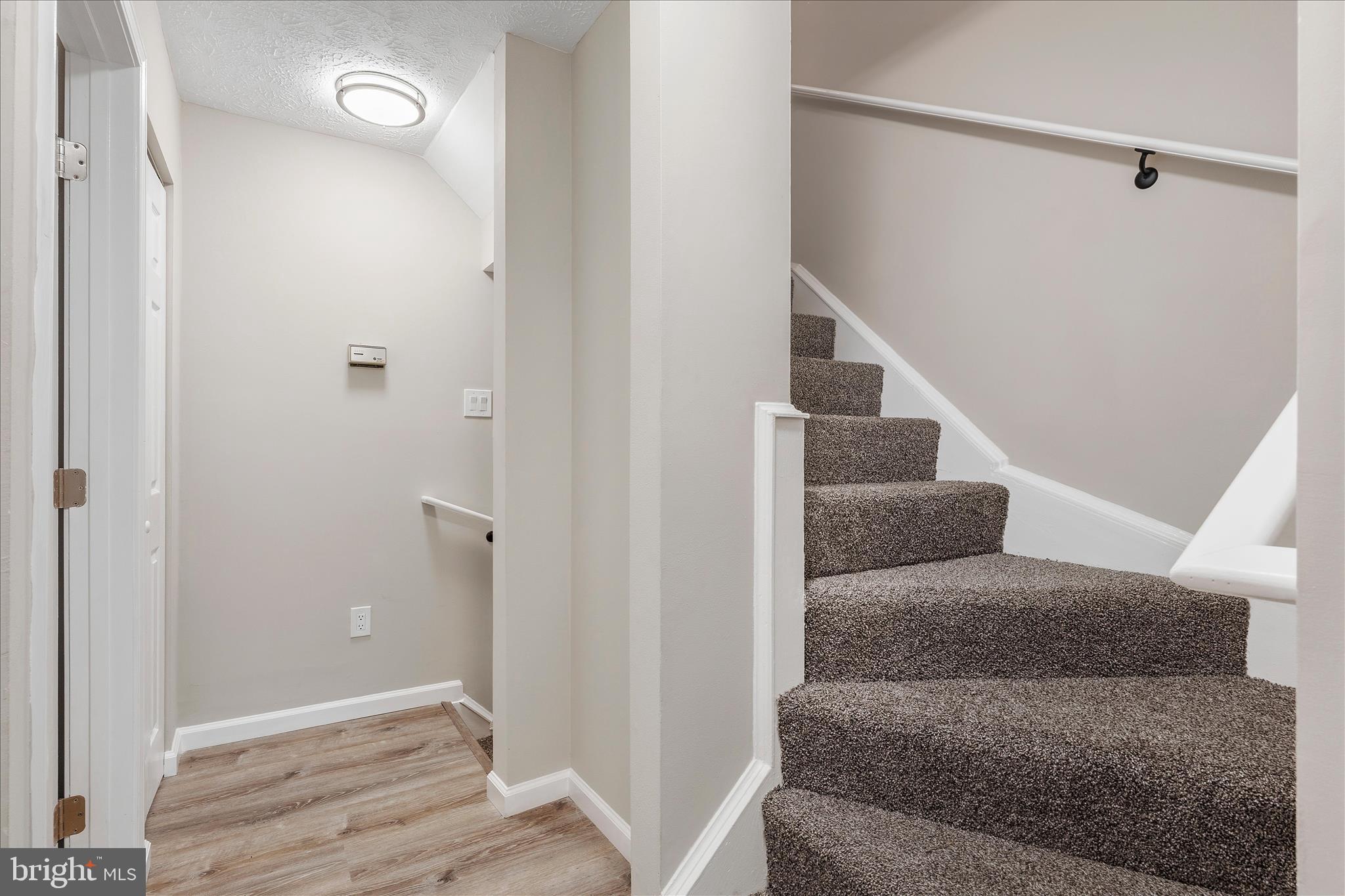1121 Harvard Street Northwest, Unit F Washington, DC 20009 - Photo 26 of 40 1st Floor Half Bath / Staircase