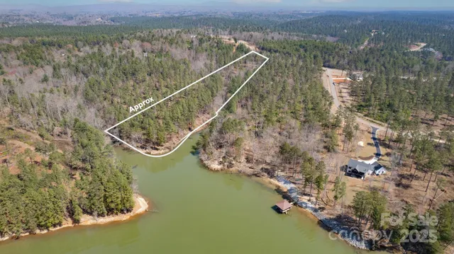a view of a lake in middle of the house
