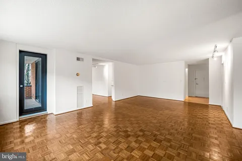 a view of an empty room and window