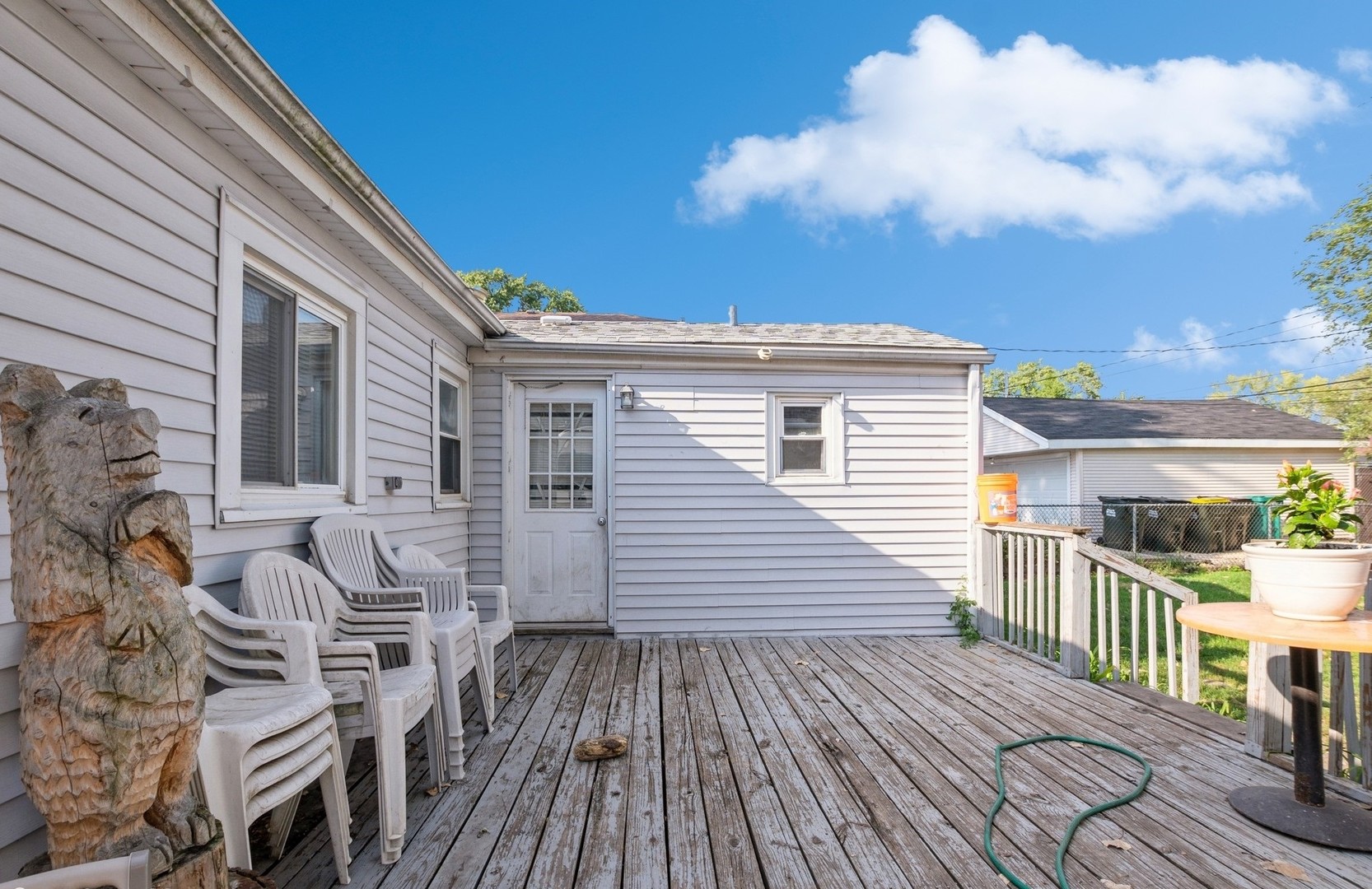 10547 Princess Avenue Chicago Ridge, IL 60415 - Photo 13 of 15 a view of a roof deck with wooden floor and fence