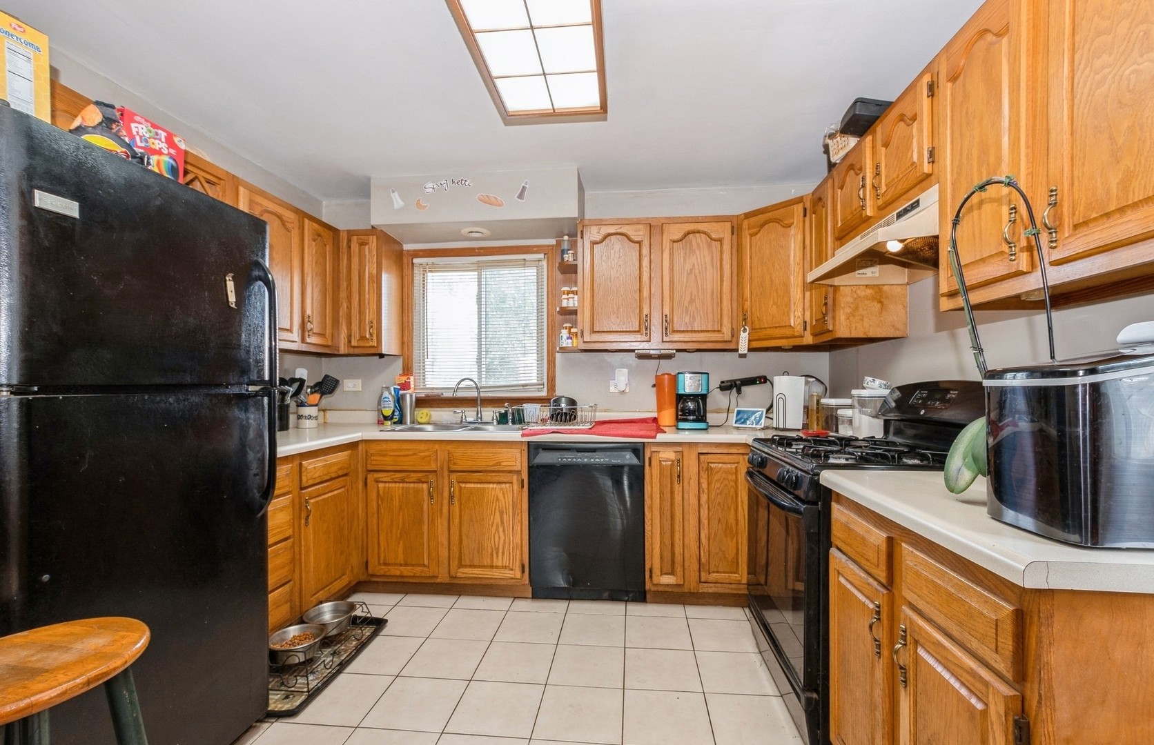 10547 Princess Avenue Chicago Ridge, IL 60415 - Photo 4 of 15 a kitchen with stainless steel appliances granite countertop a refrigerator a sink dishwasher a stove top oven a refrigerator and cabinets