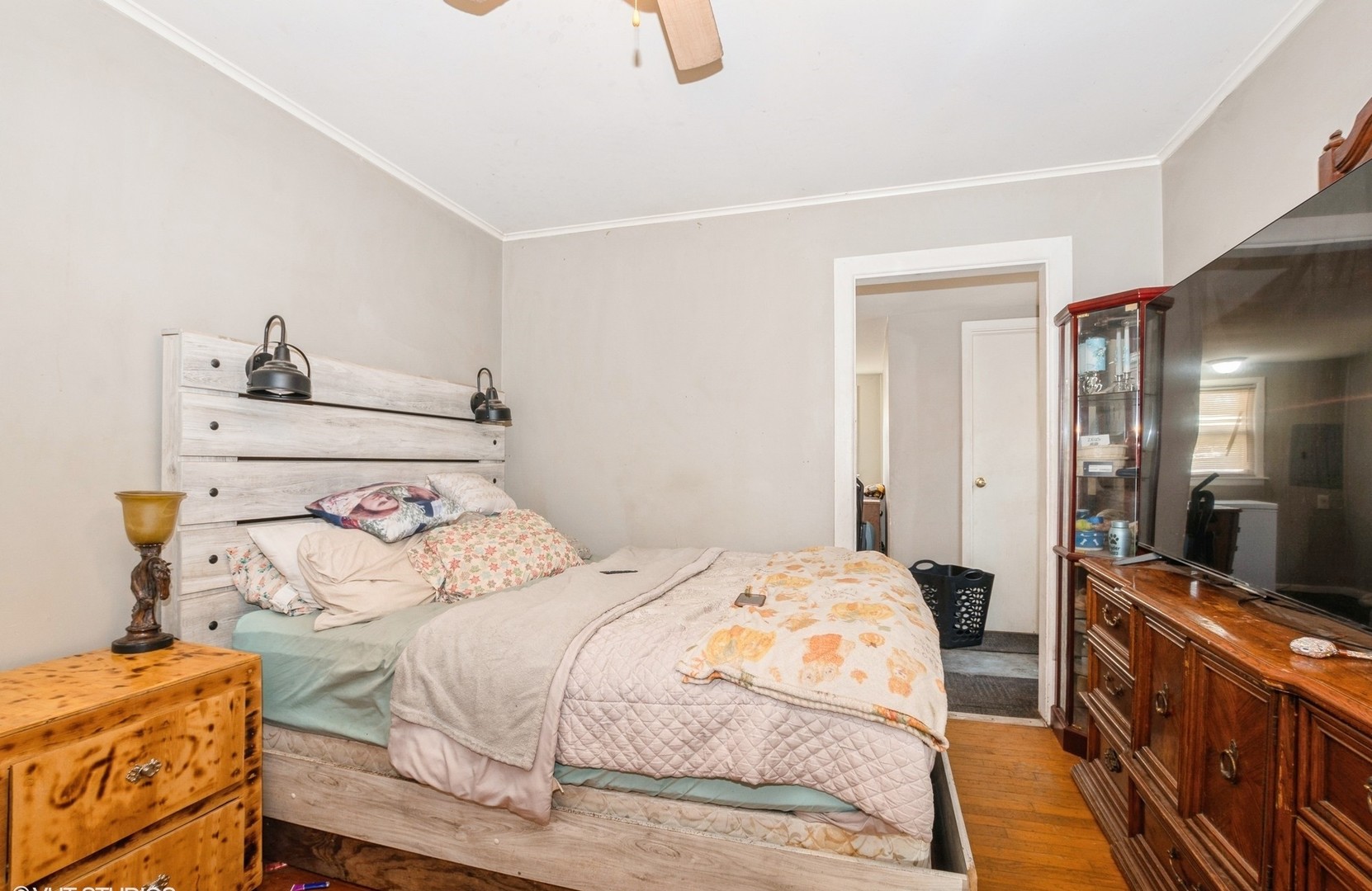 10547 Princess Avenue Chicago Ridge, IL 60415 - Photo 8 of 15 a bedroom with a bed and a large mirror on the dresser
