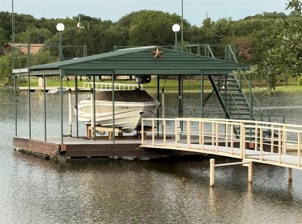 4827 Green Acres Road Graham, TX 76450 - Photo 16 of 32 an aerial view of a house with swimming pool and a yard