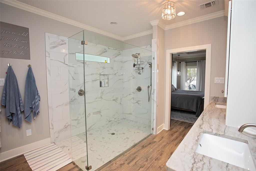 4827 Green Acres Road Graham, TX 76450 - Photo 27 of 32 a bathroom with a shower and a sink