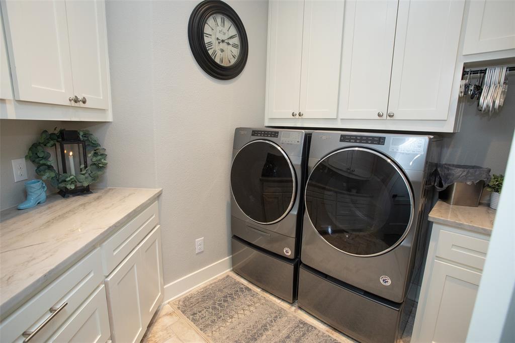 4827 Green Acres Road Graham, TX 76450 - Photo 28 of 32 a utility room with sink dryer and washer