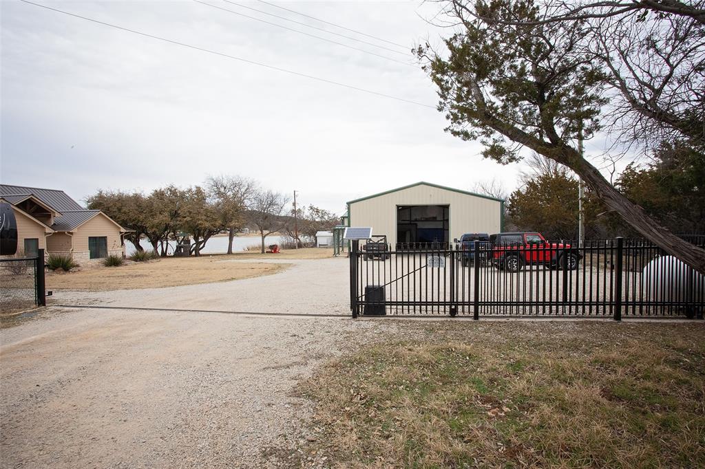 4827 Green Acres Road Graham, TX 76450 - Photo 31 of 32 a view of street along with wooden fence