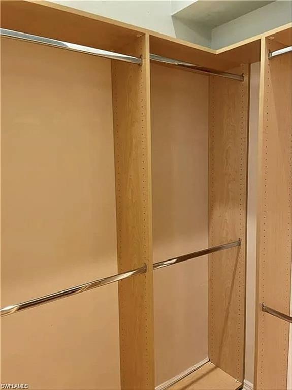 3634 Stone Way Estero, FL 33928 - Photo 13 of 27 a bathroom with a glass shower door