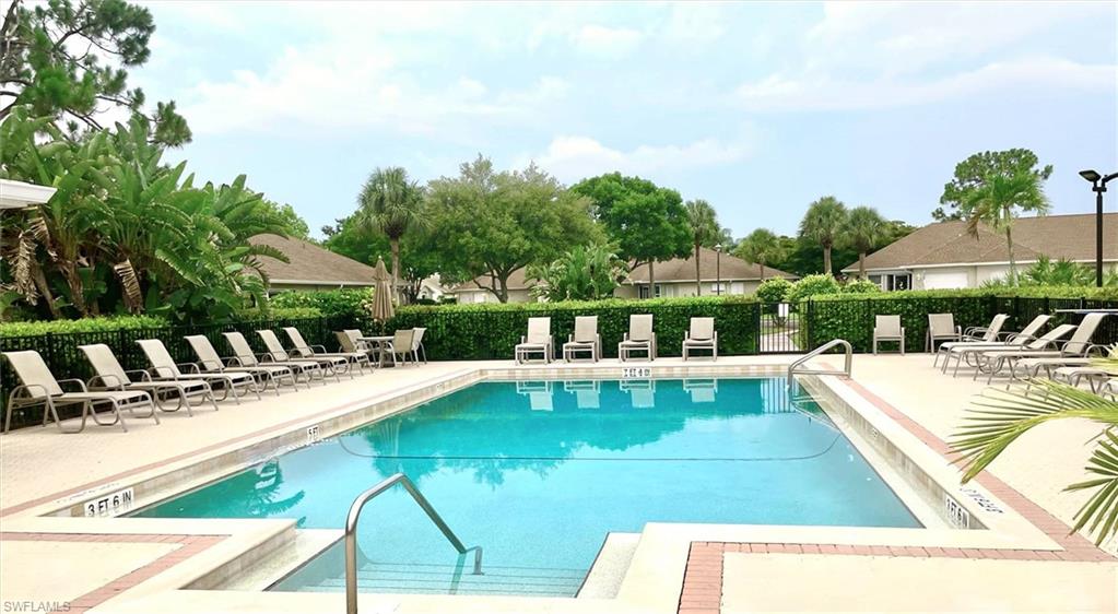 3634 Stone Way Estero, FL 33928 - Photo 2 of 27 a view of a swimming pool with chairs