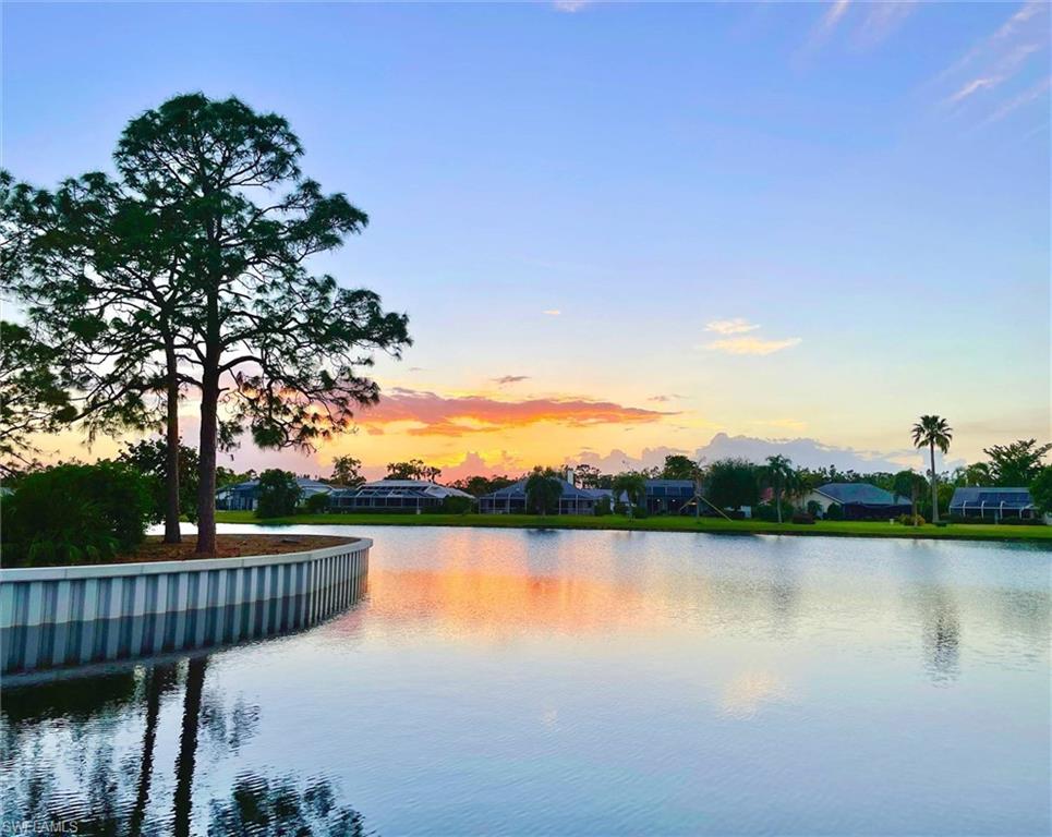 3634 Stone Way Estero, FL 33928 - Photo 23 of 27 a view of lake with deck and lake view