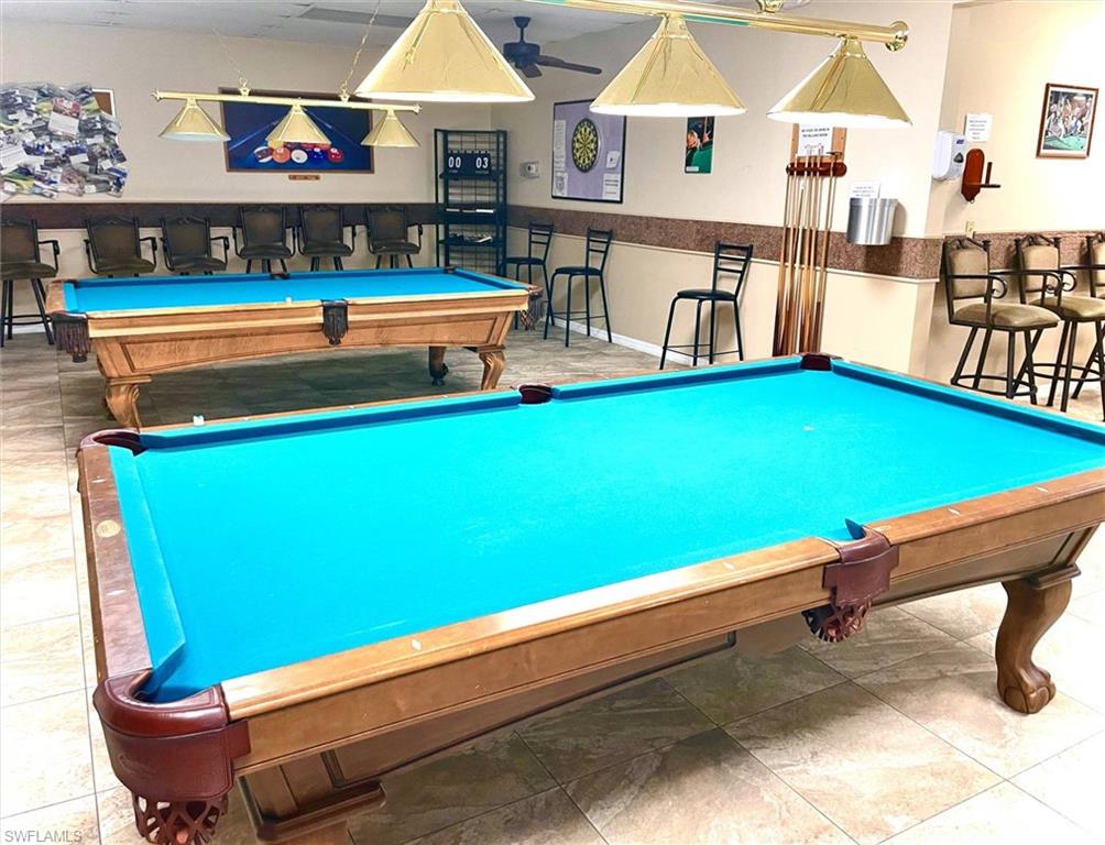3634 Stone Way Estero, FL 33928 - Photo 26 of 27 a room with furniture and air hockey table