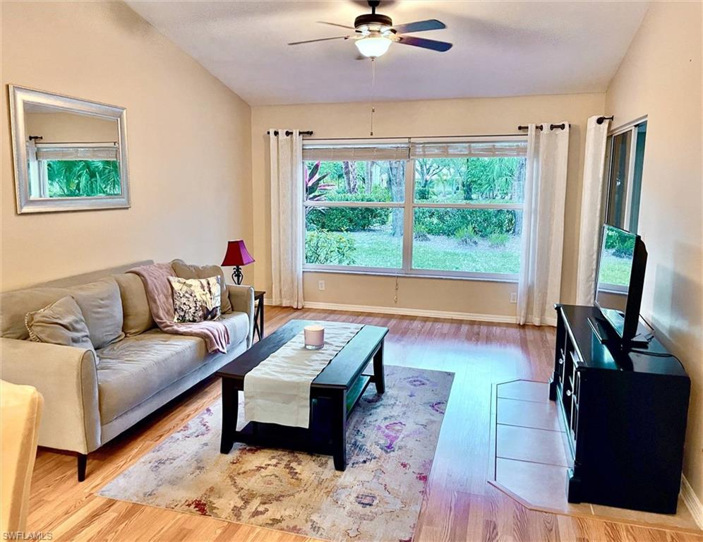 3634 Stone Way Estero, FL 33928 - Photo 7 of 27 a living room with furniture and a flat screen tv