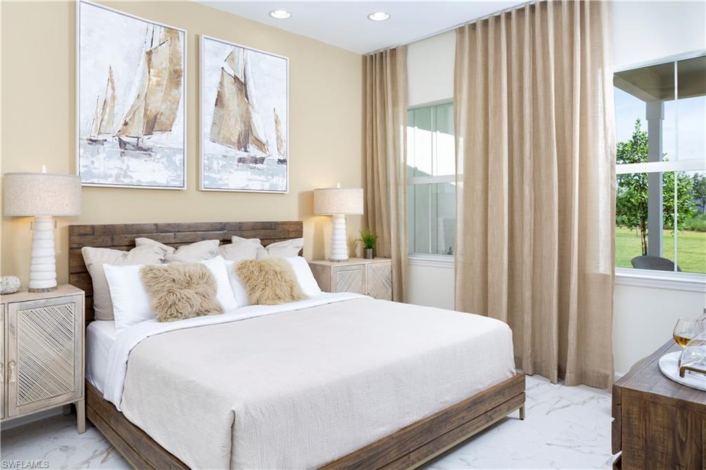 7184 Cayo Coco Lane Naples, FL 34113 - Photo 6 of 19 a bedroom with bed and a window