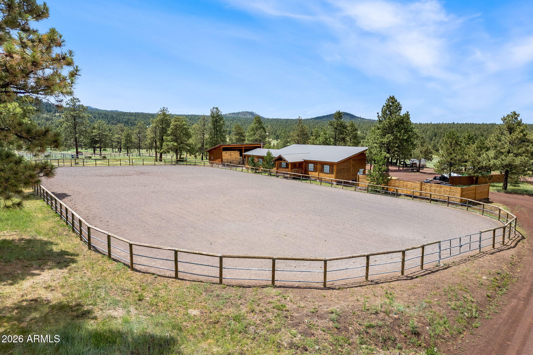 37 North 1330th, Unit 19 Greer, AZ 85927 - Photo 11 of 38 a view of a swimming pool with an outdoor seating