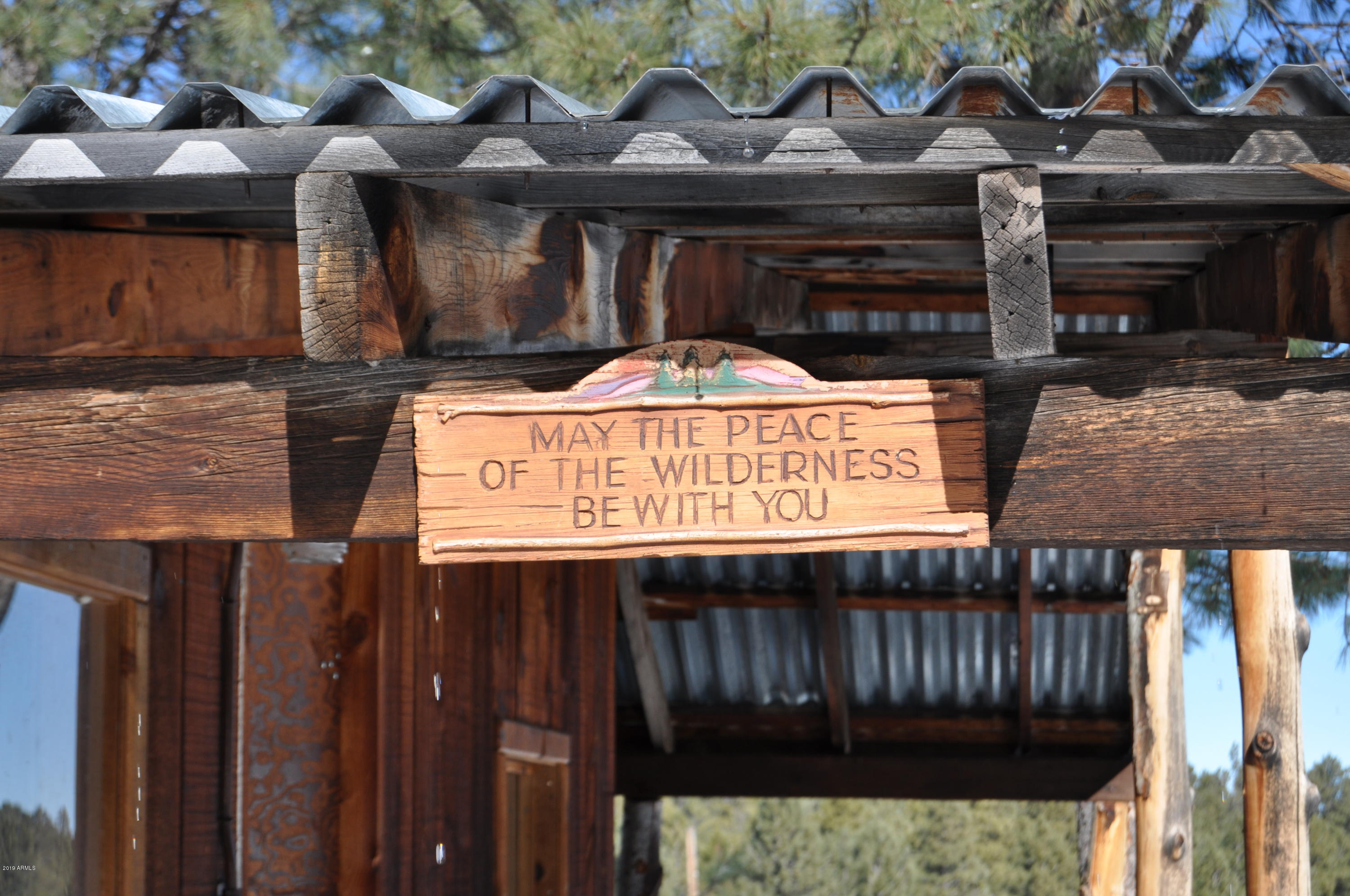 37 North Crn 1330 Road, Unit 19 Greer, AZ 85927 - Photo 13 of 13 a view of a cafe with a table and chairs