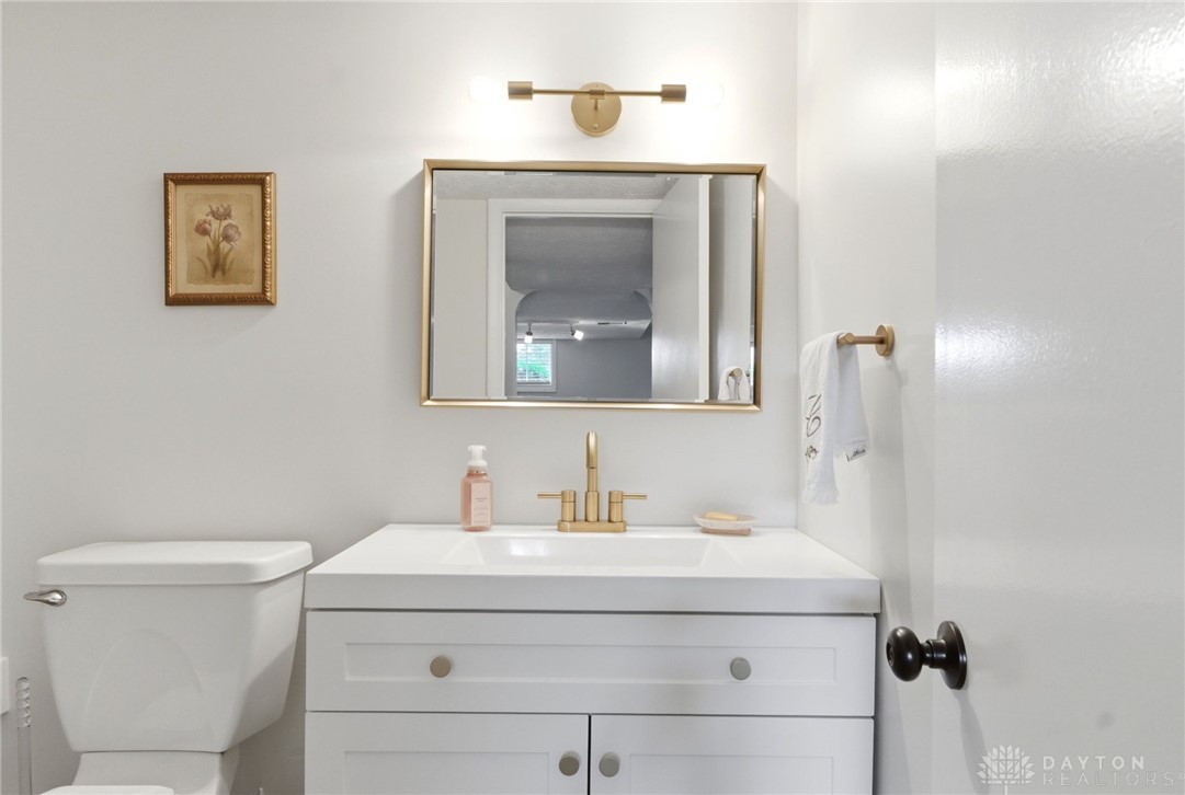 8916 Paragon Road Dayton, OH 45458 - Photo 26 of 33 This bright bathroom features a vanity with ample storage and contemporary fixtures.