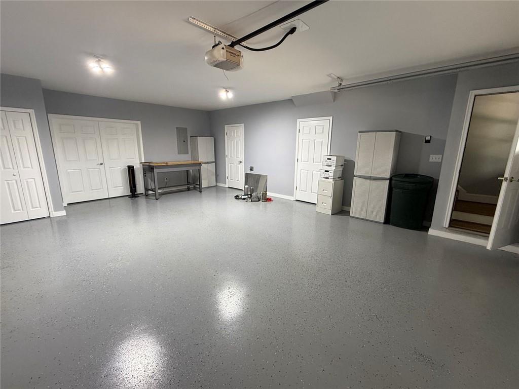 1950 Buford Dam Road, Unit 202 Cumming, GA 30041 - Photo 8 of 40 a view of a livingroom with kitchen and a window