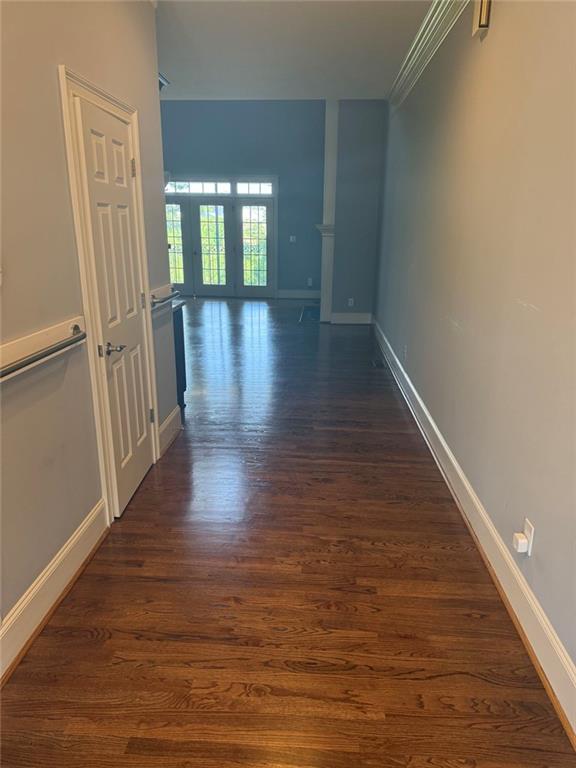1950 Buford Dam Road, Unit 202 Cumming, GA 30041 - Photo 10 of 40 a view of hallway with wooden floor