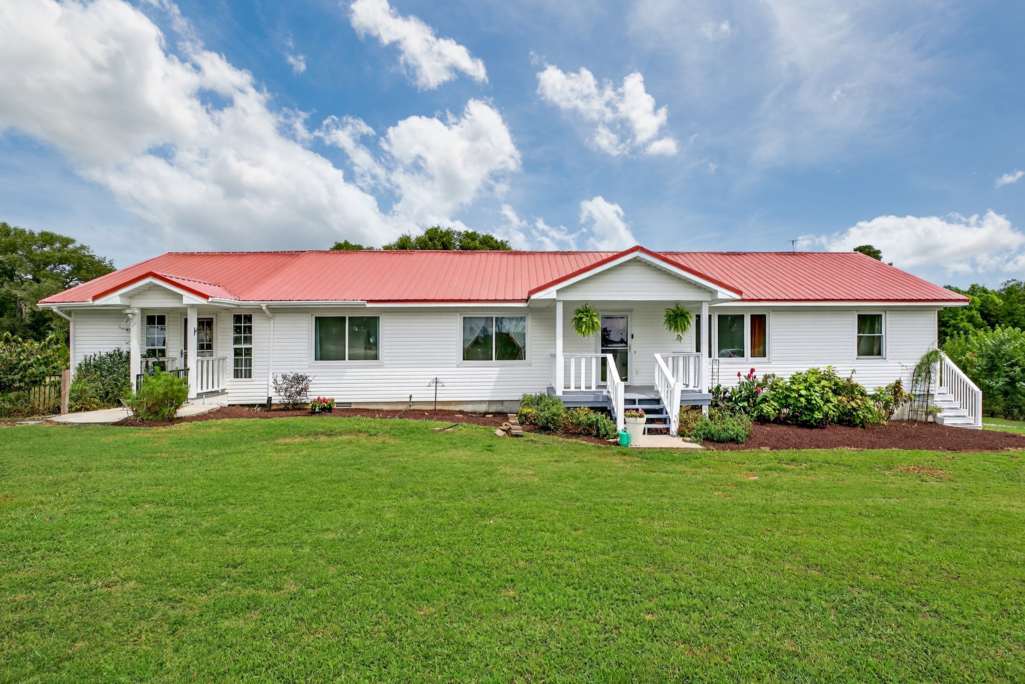 34383 Ardmore Ridge Road Prospect, TN 38477 - Photo 1 of 51 a front view of a house with garden