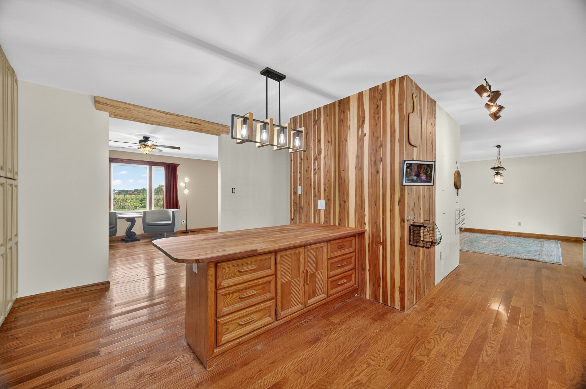 34383 Ardmore Ridge Road Prospect, TN 38477 - Photo 11 of 51 a kitchen with stainless steel appliances a dining table chairs and wooden floor