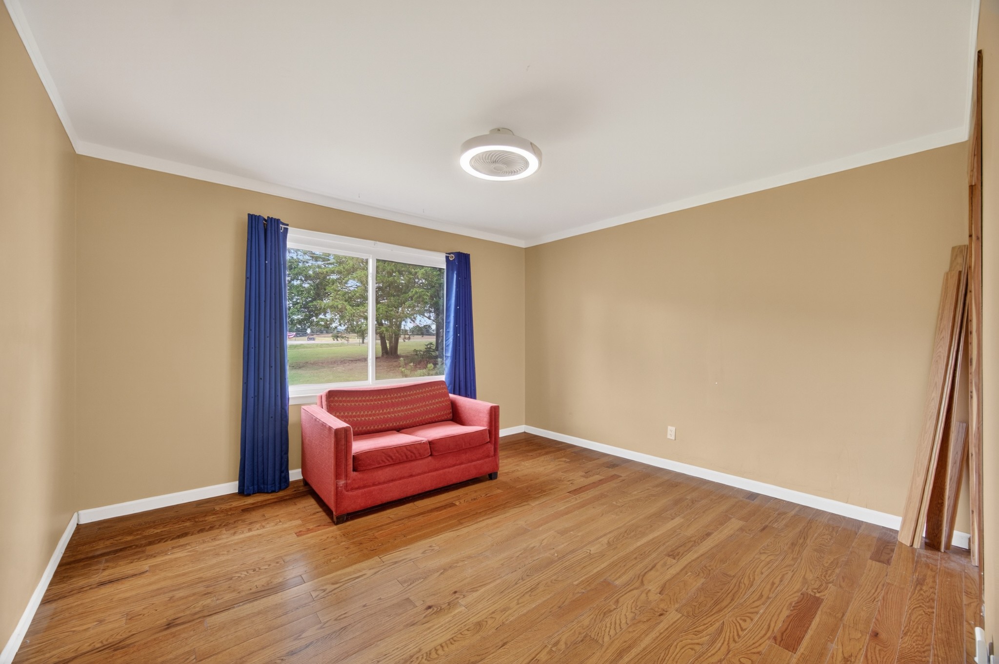 34383 Ardmore Ridge Road Prospect, TN 38477 - Photo 17 of 51 a living room with hard wood floors and a window