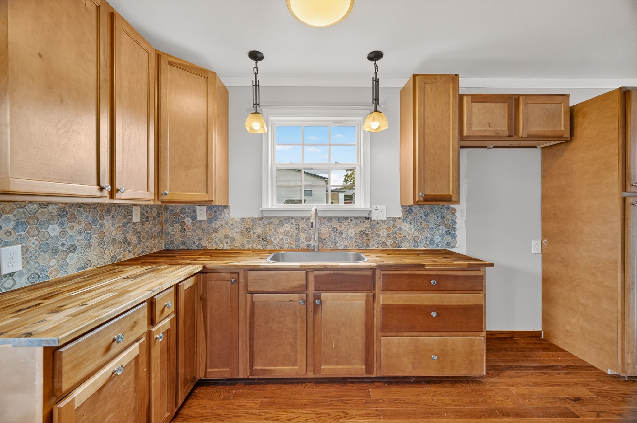 34383 Ardmore Ridge Road Prospect, TN 38477 - Photo 28 of 51 a kitchen with stainless steel appliances granite countertop a sink and a refrigerator