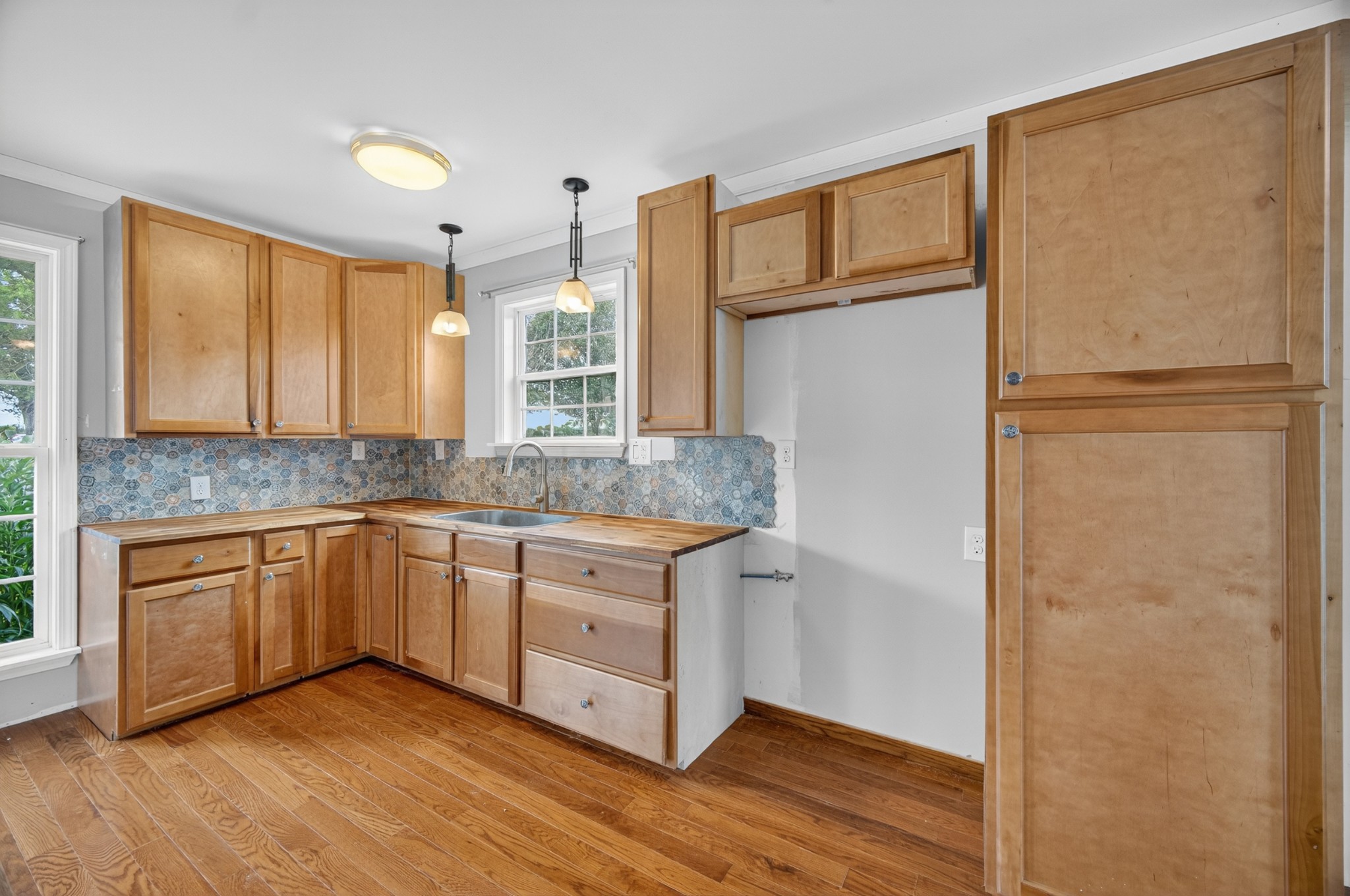 34383 Ardmore Ridge Road Prospect, TN 38477 - Photo 29 of 51 a kitchen with a refrigerator sink and cabinets