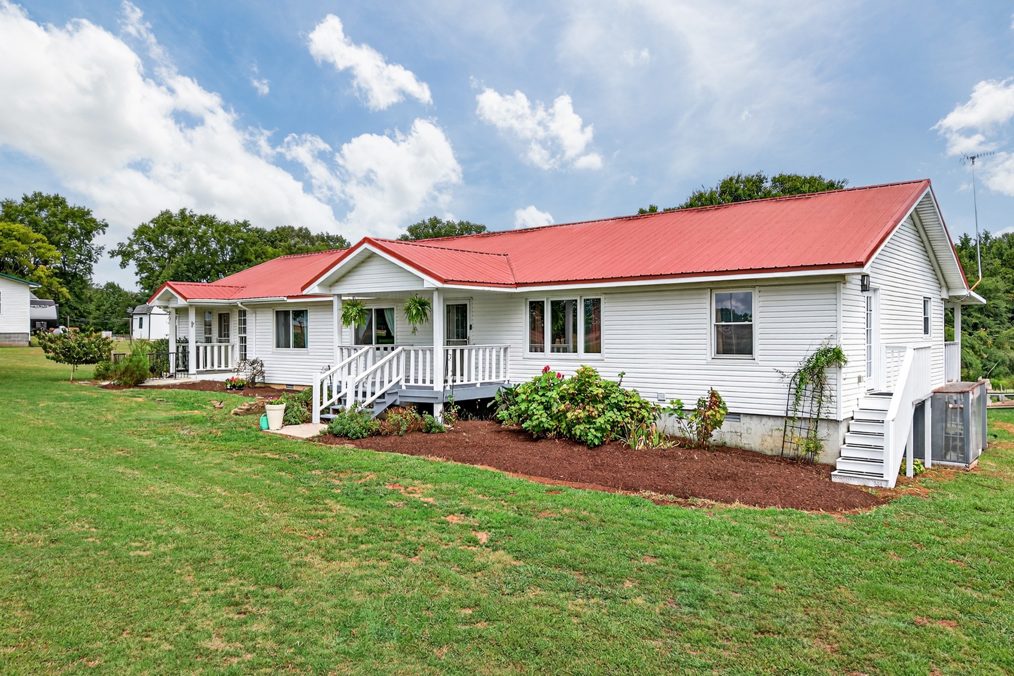34383 Ardmore Ridge Road Prospect, TN 38477 - Photo 3 of 51 a front view of a house with garden