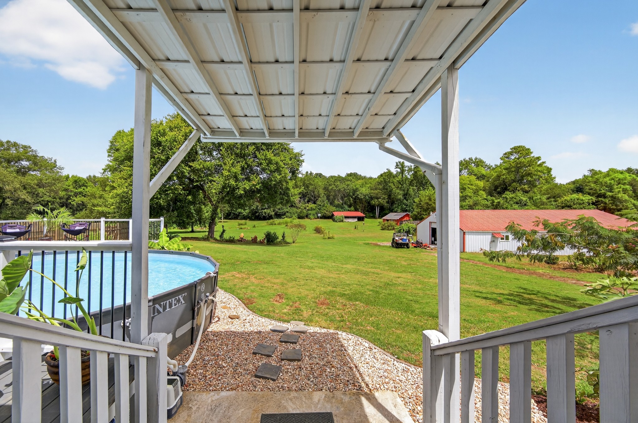 34383 Ardmore Ridge Road Prospect, TN 38477 - Photo 47 of 51 a view of a patio with a table & chairs