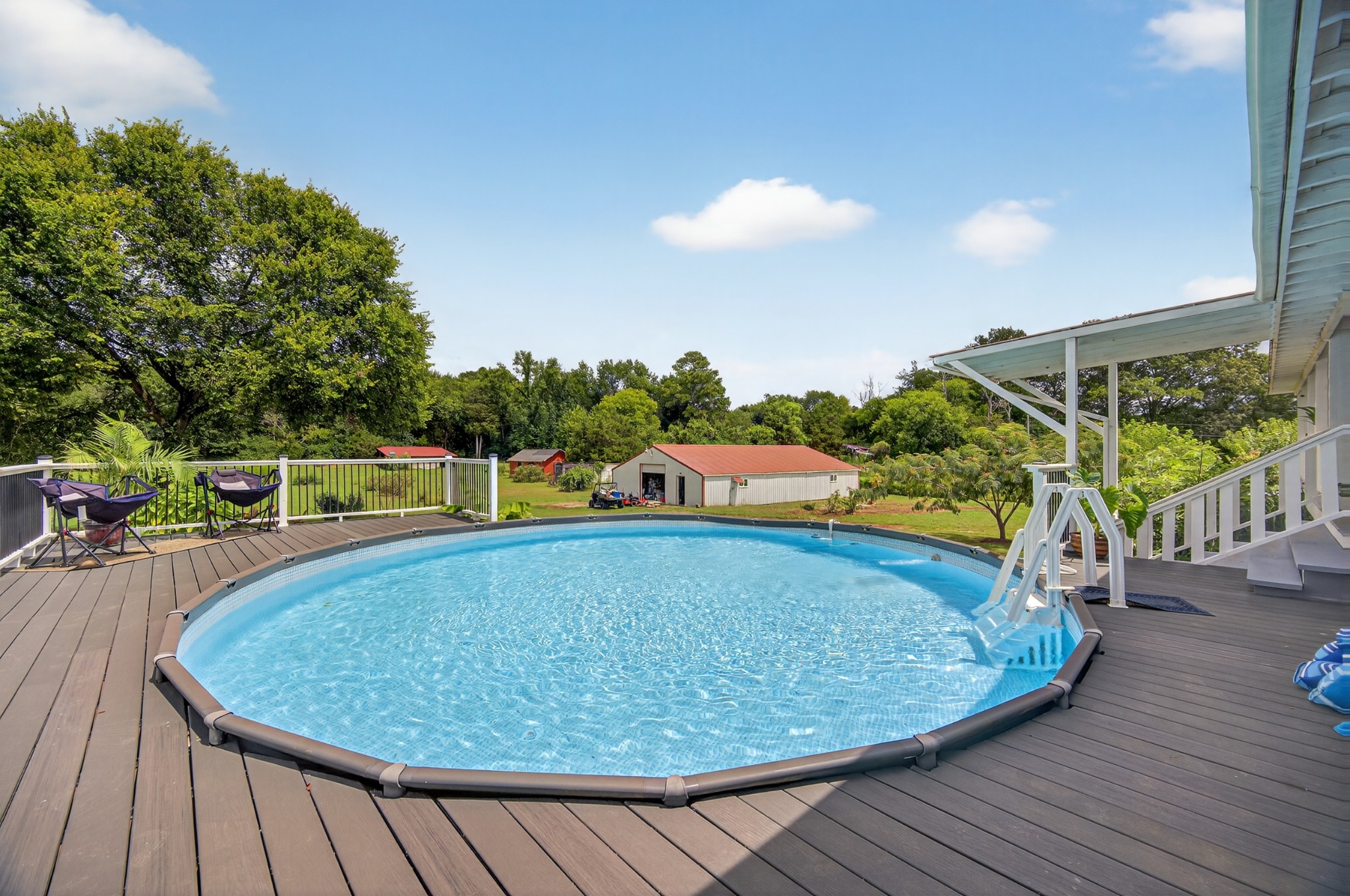 34383 Ardmore Ridge Road Prospect, TN 38477 - Photo 48 of 51 a view of a swimming pool with a patio and a yard