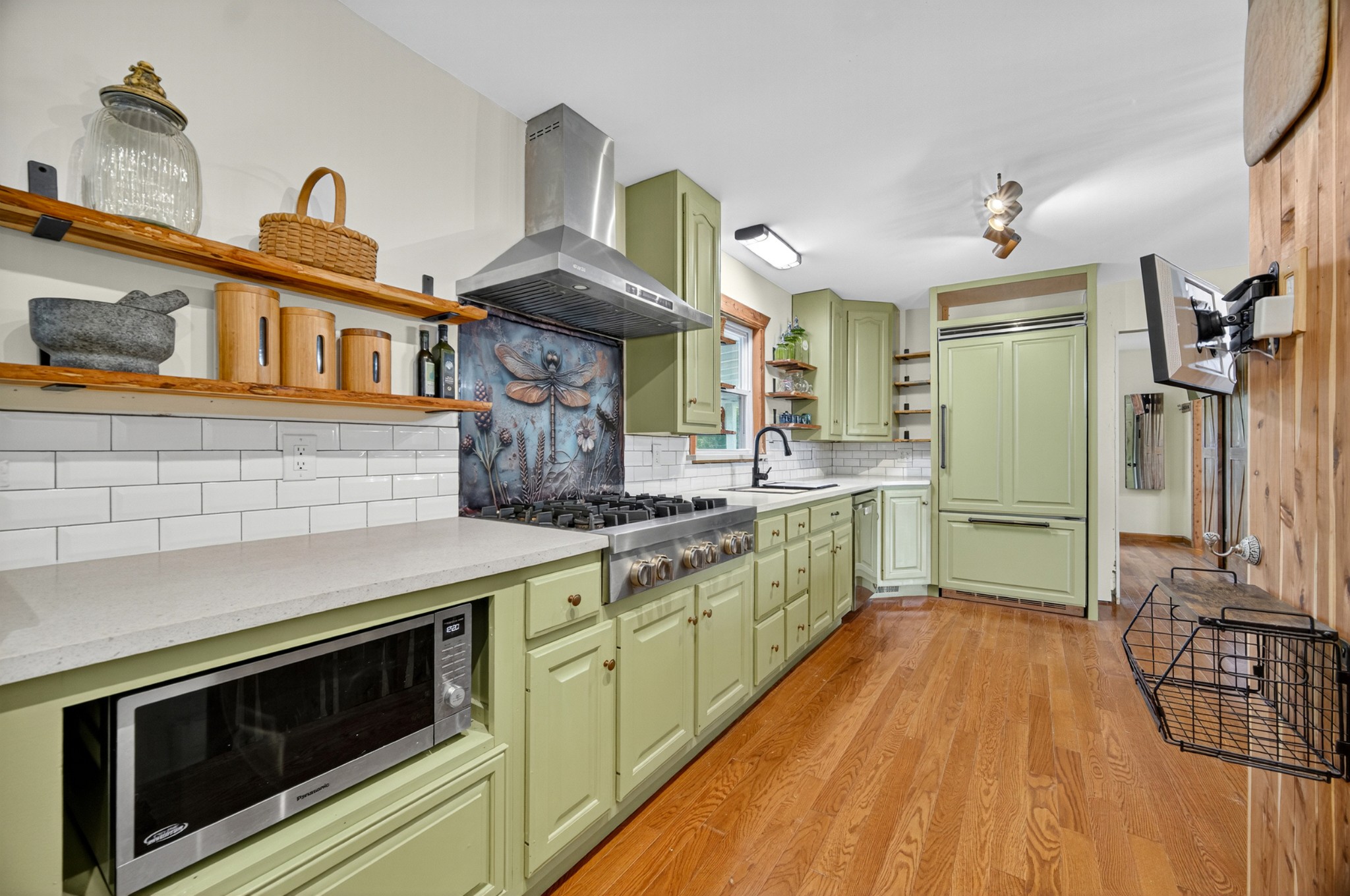 34383 Ardmore Ridge Road Prospect, TN 38477 - Photo 6 of 51 a kitchen with stainless steel appliances granite countertop a stove and cabinets