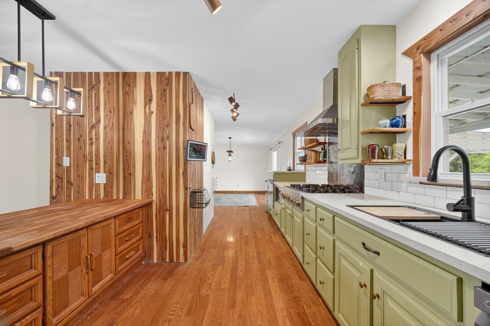 34383 Ardmore Ridge Road Prospect, TN 38477 - Photo 9 of 51 a kitchen with stainless steel appliances a sink and wooden floor