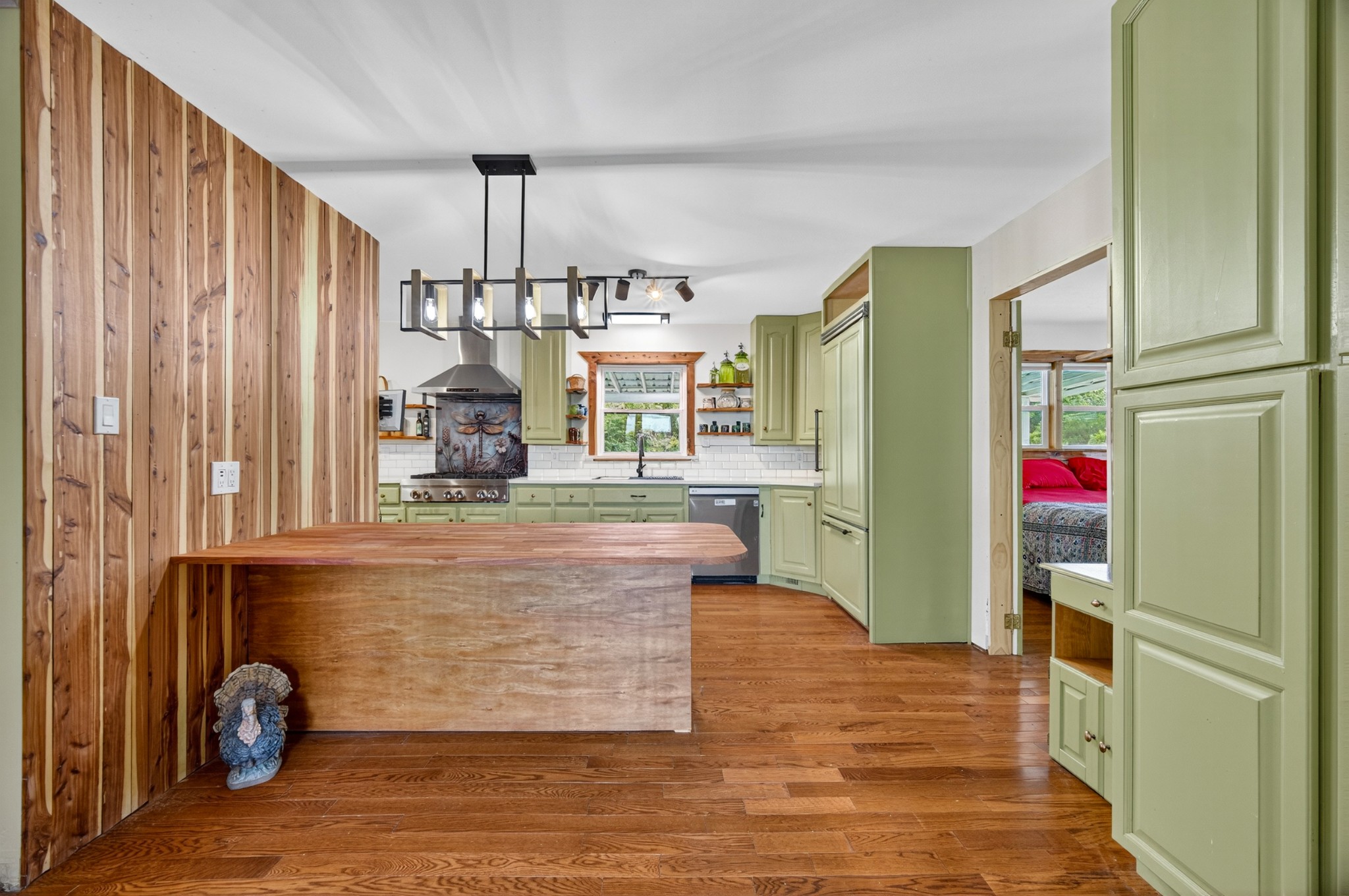 34383 Ardmore Ridge Road Prospect, TN 38477 - Photo 10 of 51 a living room with kitchen island granite countertop furniture and a fireplace