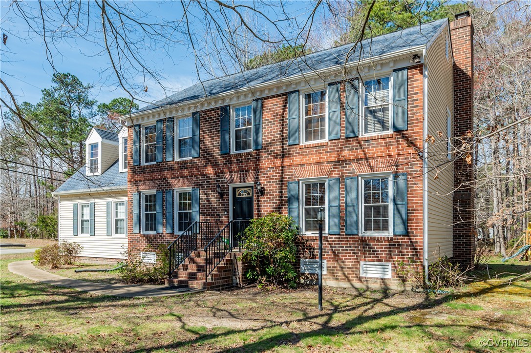 7400 Cannock Road Chesterfield, VA 23832 - Photo 1 of 36 a front view of a house with a yard