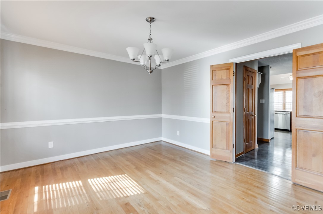 7400 Cannock Road Chesterfield, VA 23832 - Photo 15 of 36 wooden floor in an empty room with a window