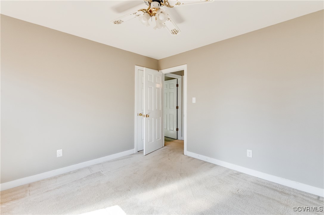 7400 Cannock Road Chesterfield, VA 23832 - Photo 21 of 36 a view of a chandelier fan in big room