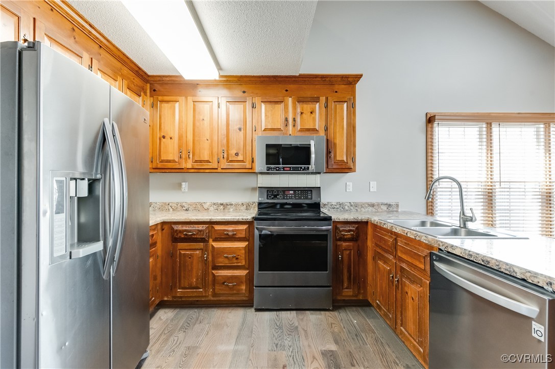 7400 Cannock Road Chesterfield, VA 23832 - Photo 6 of 36 a kitchen with stainless steel appliances granite countertop a stove top oven a refrigerator and a sink
