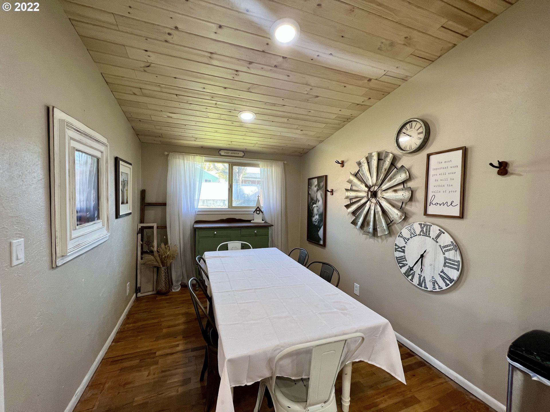 3026 Southwest Hailey Avenue Pendleton, OR 97801 - Photo 8 of 15 a view of a dining room with furniture and wooden floor