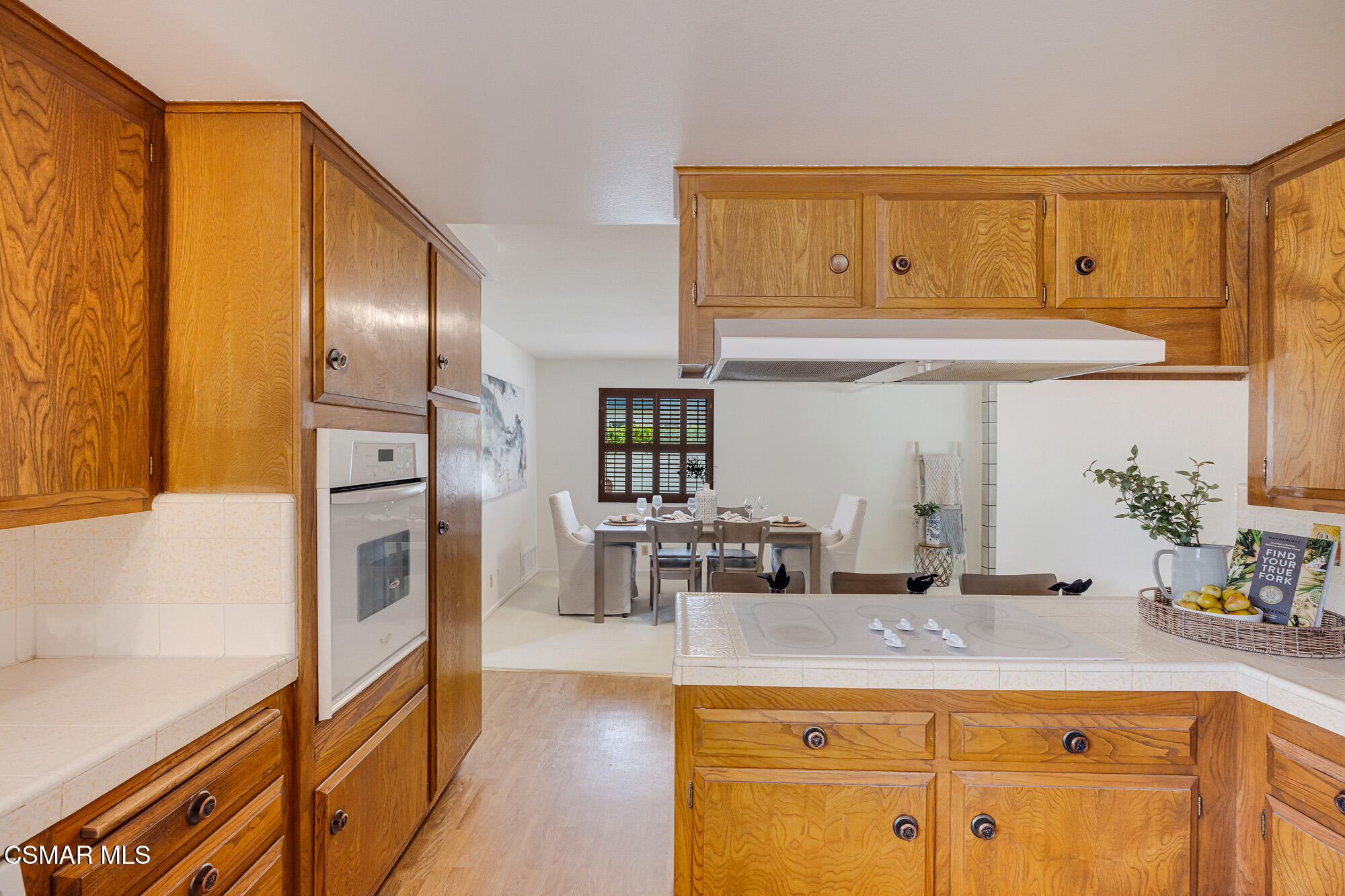 3491 Rivermore Street Camarillo, CA 93010 - Photo 13 of 49 a kitchen with stainless steel appliances granite countertop a sink and cabinets
