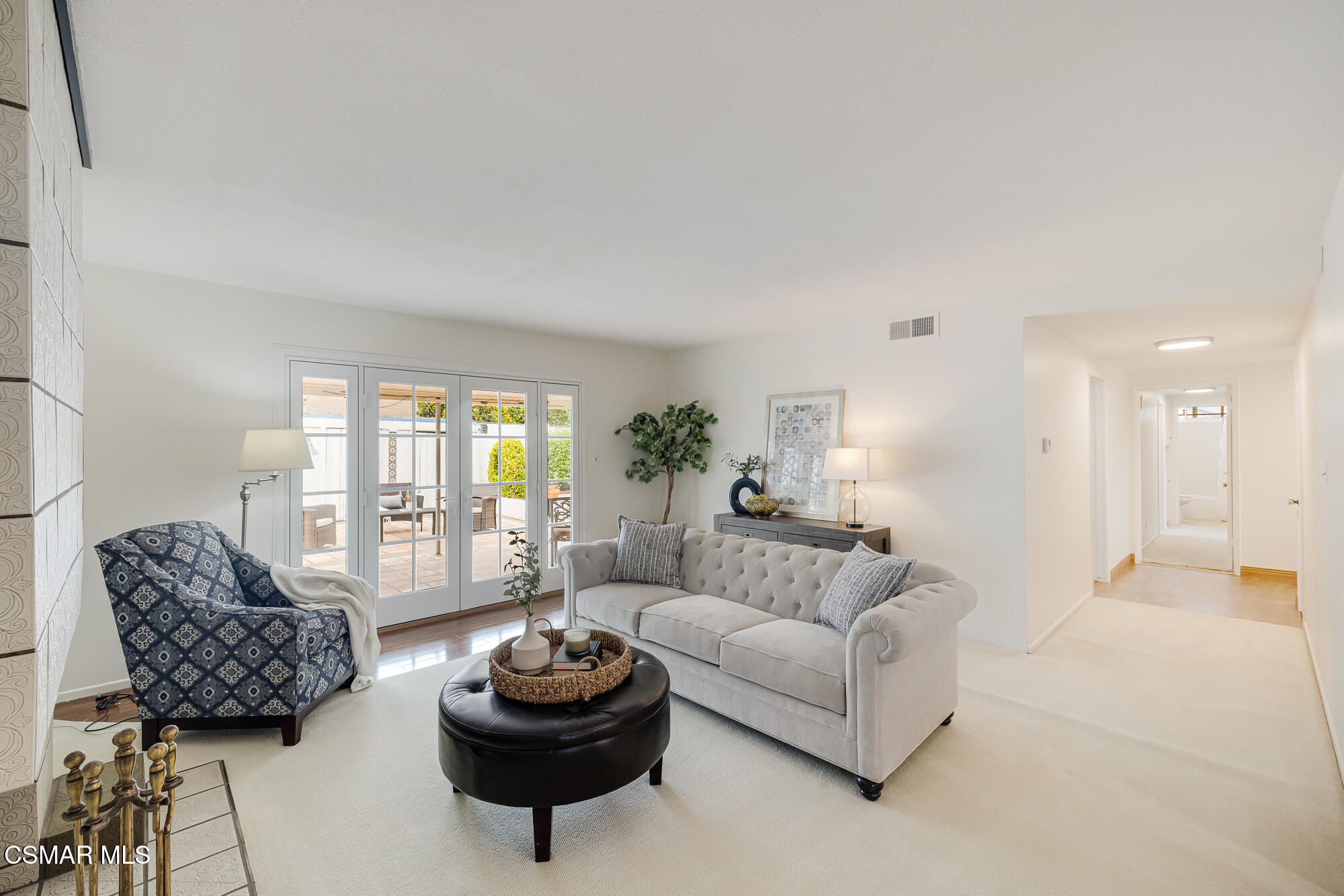 3491 Rivermore Street Camarillo, CA 93010 - Photo 18 of 49 a living room with furniture a rug and a large window