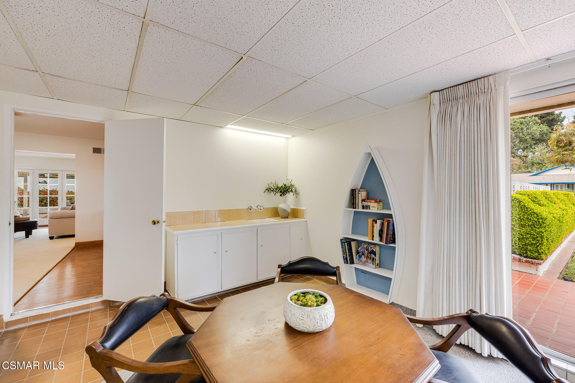 3491 Rivermore Street Camarillo, CA 93010 - Photo 26 of 49 a view of a dining room with furniture and a wooden floor