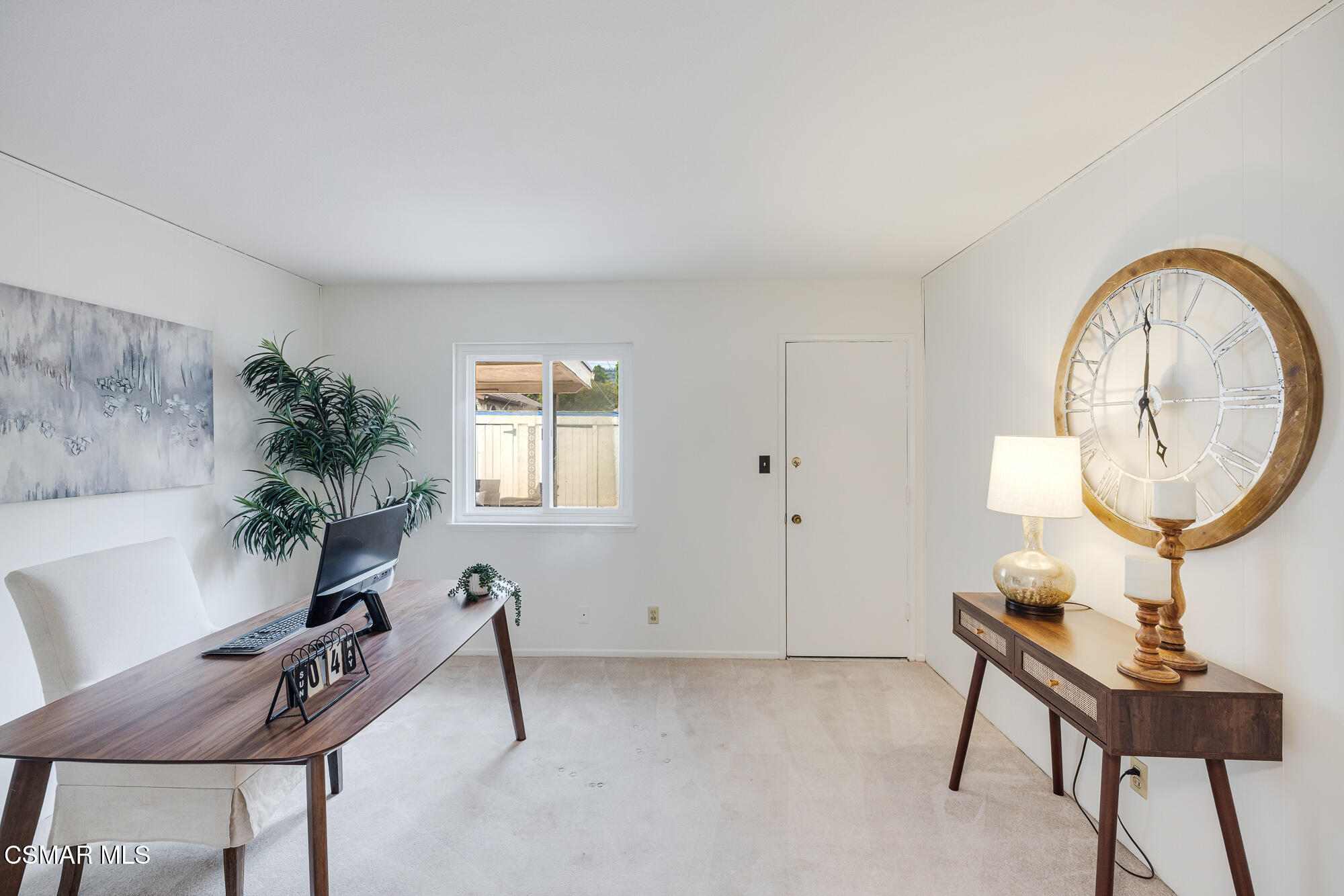 3491 Rivermore Street Camarillo, CA 93010 - Photo 27 of 49 a room with furniture a window and a potted plant