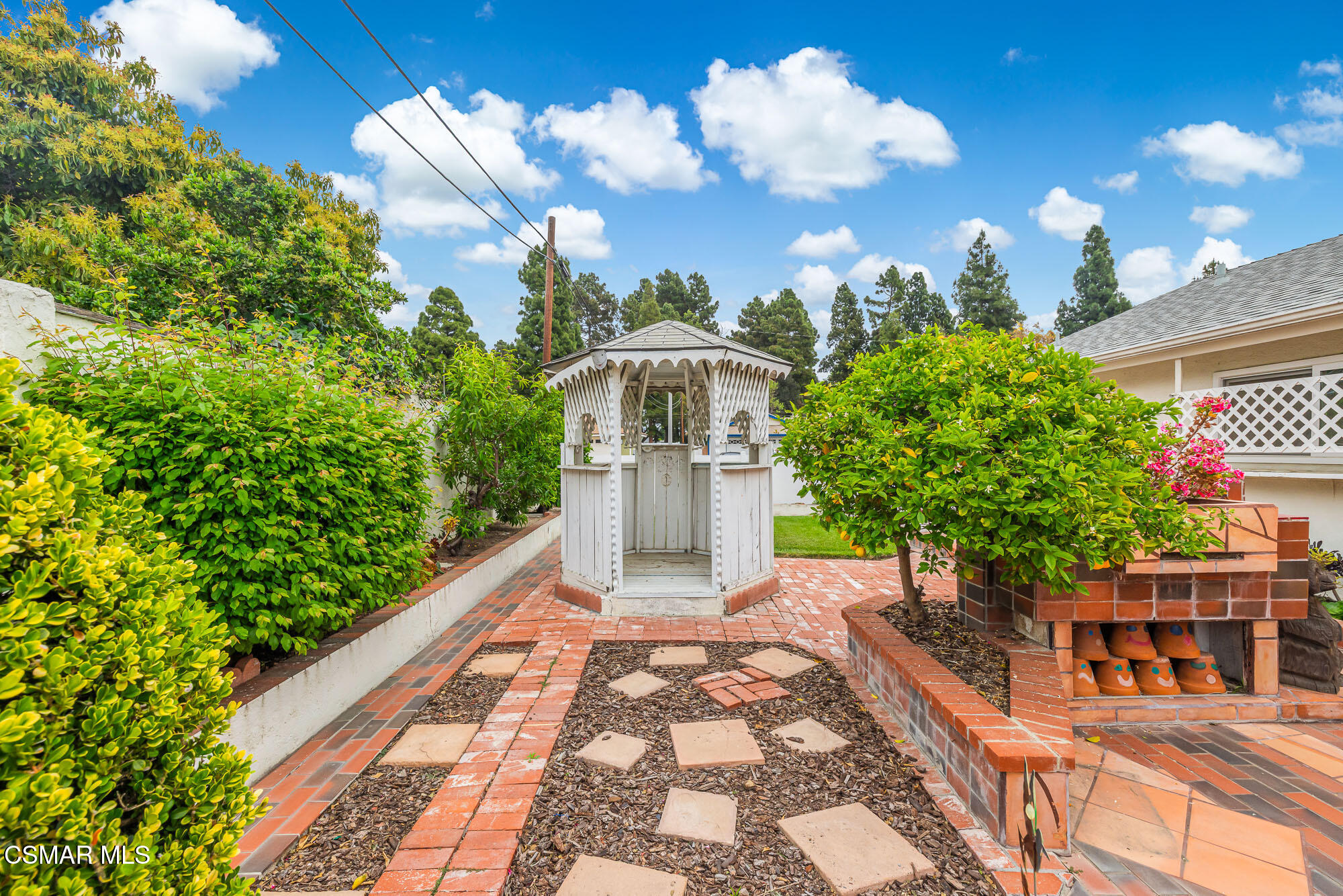 3491 Rivermore Street Camarillo, CA 93010 - Photo 38 of 49 a view of a house with a yard and garden